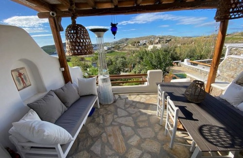 Psarou Villa | Beautiful Cycladic style house overlooking the sea