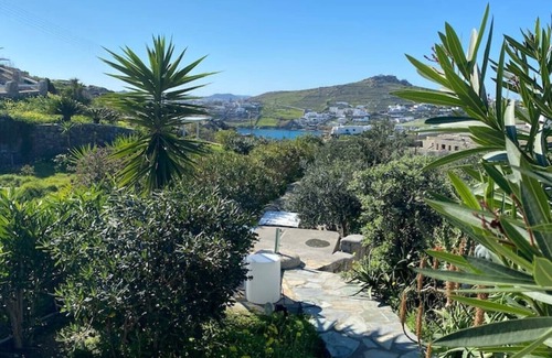 Psarou Villa | Beautiful Cycladic style house overlooking the sea