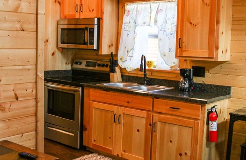 Pipe Creek Cabin | Beautiful Log cabin overlooking a meadow