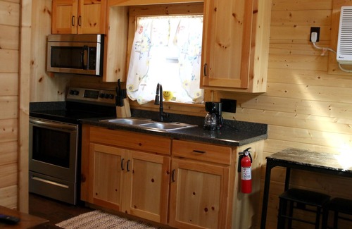 Pipe Creek Cabin | Beautiful Log cabin overlooking a meadow