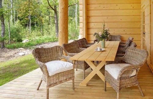 Vaxtorp Cabin | Beautiful luxury log cabin. Two private terrasses. Open fireplace. Pet friendly