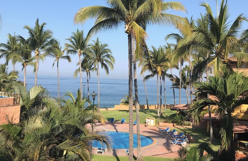 South Hotel Zone Condo | Beautiful oceanfront condo amid the palms of Los Tules