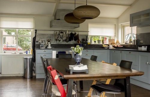 Municipality of Weesp House | Beautiful original windmill along the riverside
