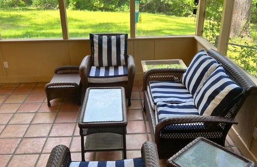 Tallahassee House | Beautiful-Patio-Ping Pong-Arcade fence yrd