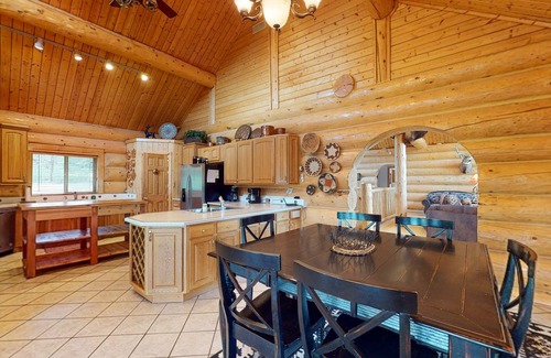San Juan River Village Cabin | Beautiful Riverfront Log Cabin with Mountain Views, Firepit, and Gas Grill