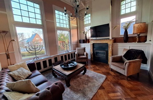Sint Jacobiparochie House | Beautiful villa with jacuzzi, gym and steam shower in Friesland