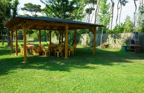 Viareggio House | Beautiful wooden house with veranda and close to the beach.