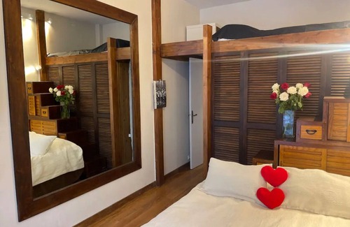 Porte-Dauphine House | Bedroom and small study on veranda overlooking quiet garden