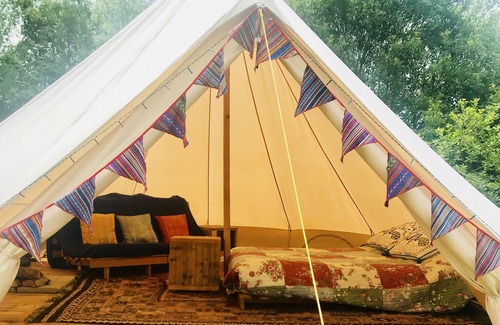 Whichford RV Rental | Bell Tent - fitted with wood-burning stove & double bed