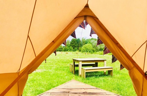Whichford RV Rental | Bell Tent - fitted with wood-burning stove & double bed