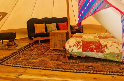 Whichford RV Rental | Bell Tent - fitted with wood-burning stove & double bed