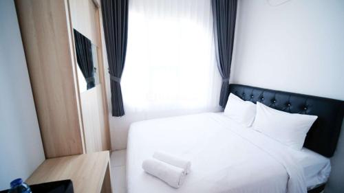 Surabaya Apartment | Best Location and Restful 1BR at The City Square Apartment By Travelio