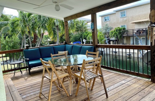 Key West House | Best of Both Worlds! 3 bedroom, pool, canal, boat dock. 9 miles from downtown!