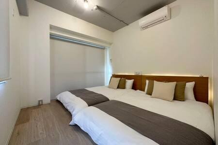 Hiroshima City Centre Apartment | bHOTEL Art Bldg - Modern 2BR City Center for 8ppl