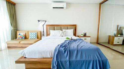 Bangka Apartment | Big and Comfy Studio at Kemang Village Apartment By Travelio