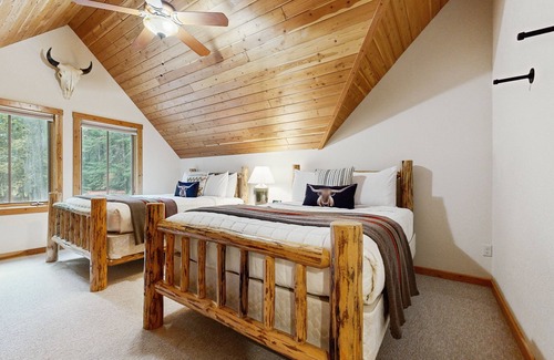 Bigfork House | Big Fork rustic loft cabin with forest views, WiFi, 5 miles to Flathead Lake