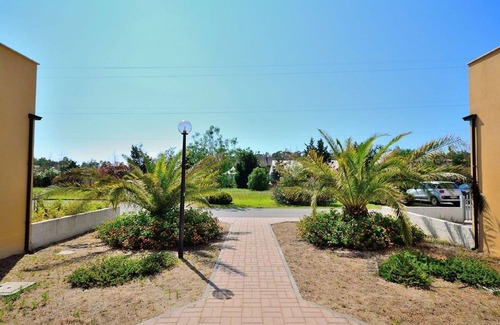 Contrada Difesa II VV Apartment | Blue Bay; a comfortable one-bedroom ground floor apartment with communal pool