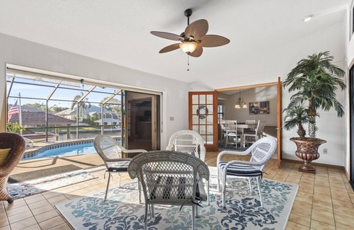 Palm Harbor House | Blue Haven Large Waterfront Pool Home | Boat Dock | Canal | Water Views | Pool Bar | WIFI | Fishing