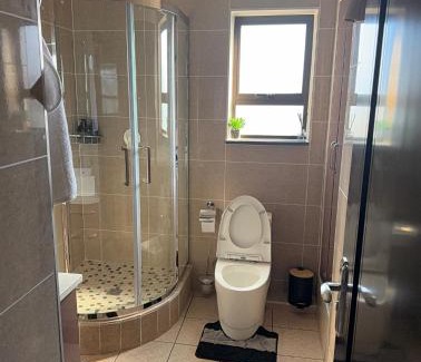 Greater Johannesburg Metropolitan Area Apartment | Blue lake estate Luxury and modern apartment with free WiFi and air conditioning close to Mall of Africa and Waterfall Corner