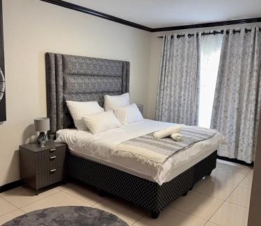 Greater Johannesburg Metropolitan Area Apartment | Blue lake estate Luxury and modern apartment with free WiFi and air conditioning close to Mall of Africa and Waterfall Corner
