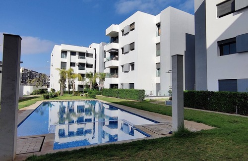 Temara House | Blue Themed Vacation Condo close to the beach and with view on the pool