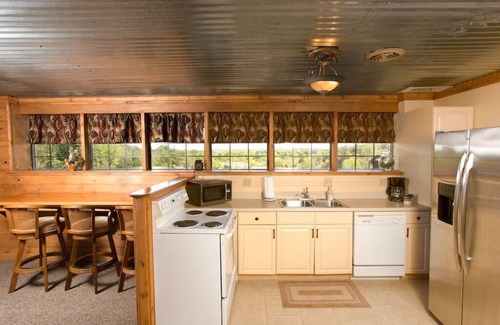 Sand Springs Cabin | Blufftop cabin with private patio and gorgeous views!