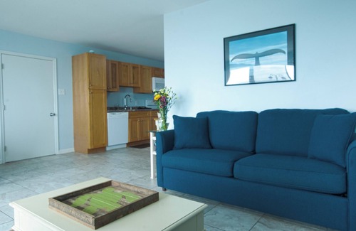 North End Apartment | Boardwalk gem. Enjoy your private deck and watch the ocean.