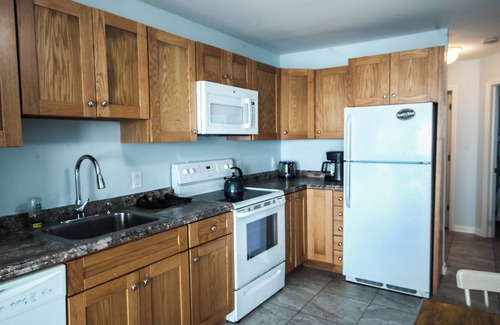 North End Apartment | Boardwalk gem. Enjoy your private deck and watch the ocean.