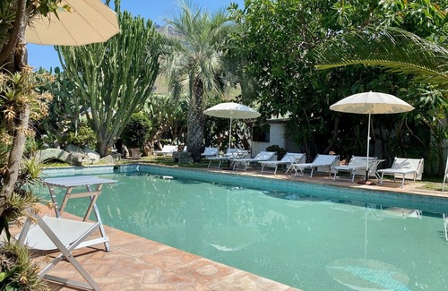 Panza Apartment | "Bougainvillea cottage" with garden, swimming pool and spa hot tub