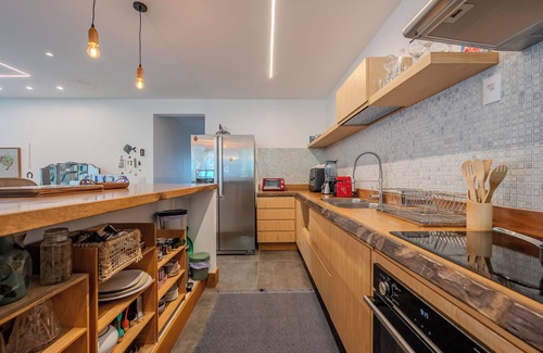 Barra da Tijuca Apartment | House-style apartment in Largo da Barra