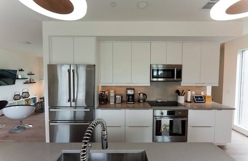Laurel Park Condo | Brand New Luxury Townhouse in Downtown Sarasota w/Elevator, Kayaks, and bicycles