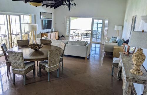 Oistins Apartment | Breezy Ocean Front Condo Close to The Best Beaches