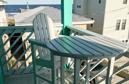 Carolina Beach Condo | ☀ Breezy, Open Condo, Steps from Beach and Boardwalk with Ocean Views & Pool ☀