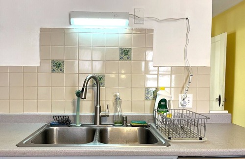 Kent House | Bright and Spacious 3-bedroom house with large patio and sprawling yard.