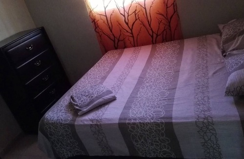 Ensanche Isabelita Apartment | Bright and youth condo with hot water.