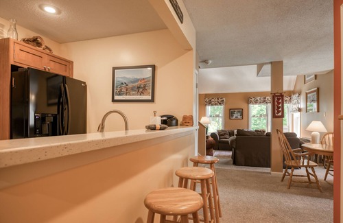 North Conway Condo | Bright condo with WiFi, fireplace, outdoor pool, & excellent location