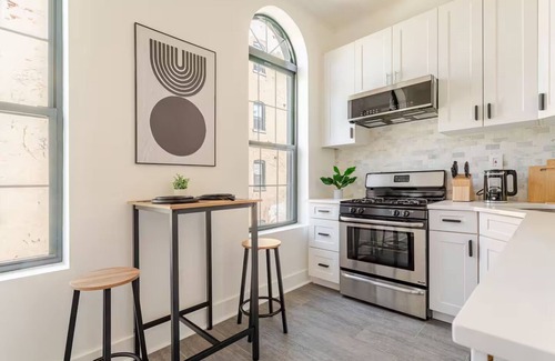 The Heights Apartment | Bright & Stylish Brownstone Retreat Mins from NYC