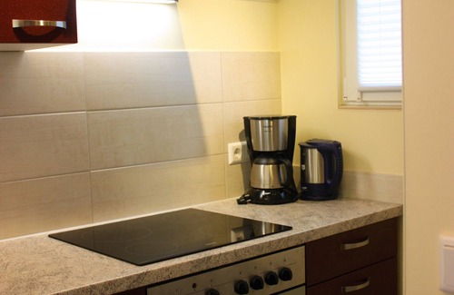 Muritz House | Bungalow "Morgenrot", 250m to the Müritz + boat mooring