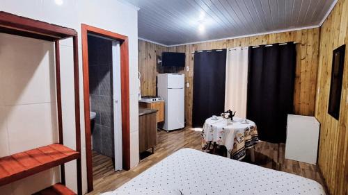 Osorio House | Cabana Cristal ll Campestre Em Sítio ll Wi-Fi Nômade Digital ll Táxi Fácil II Forno Microondas ll Quiosque Churrasqueira ll 6km da Estrada do Mar ll 8,1Km Prefeitura II 7,2Km UFRGS Litoral II 12km do Morro da Borrusia e das Praias Tramandai