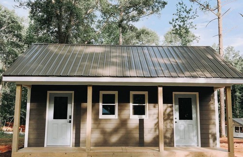 Hartwell RV Rental | Cabin #6: Studio style layout with kitchenette and a large gravel parking pad beside the cabin for easy boat or trailer storage.