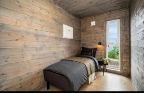 Aure House | Cabin at the end of Skardsøya towards the sea - boat