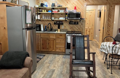 Carlisle Cabin | Cabin Bunkhouse with Hot tub Private Lake view in Vian, OK!