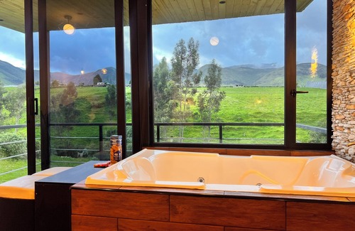 Cangahua Cabin | Cabin by the river with a view of the Cayambe snow-capped mountain