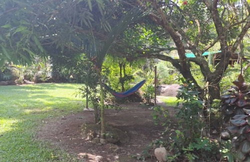 Penas Blancas Cabin | Cabin in La Fortuna with rustic finishes, river and forest