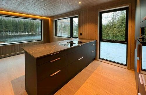 Bygland House | Cabin With Dock By Otra In Setesdal