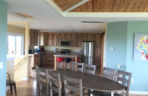 Carova Beach House | Canal front. 4WD area. Hot tub. Screened-in porch. Large deck. Game room.
