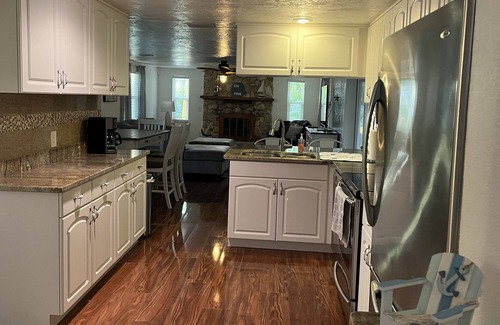 Hudson Beach Estates House | Canal front home minutes to Gulf of Mexico with back yard oasis.