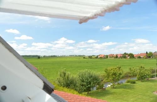 Wirdum House | Canoe, canal location with jetty, terrace, WLAN, quiet location
