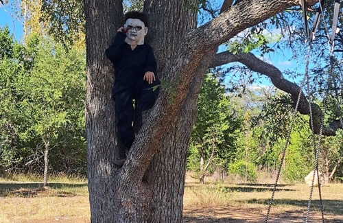 Pipe Creek RV Rental | Canvas Tipi on wooden deck overlooking a season creek.