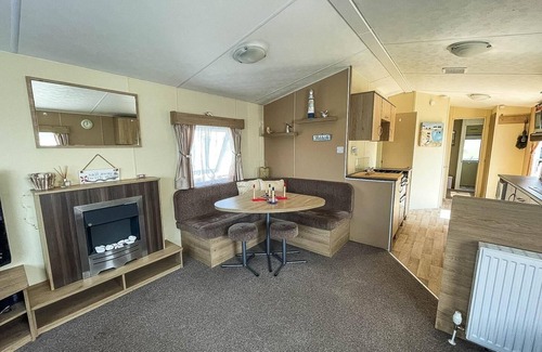 Colchester House | Caravan with large decking at Coopers Beach Holiday Park ref 49036TS